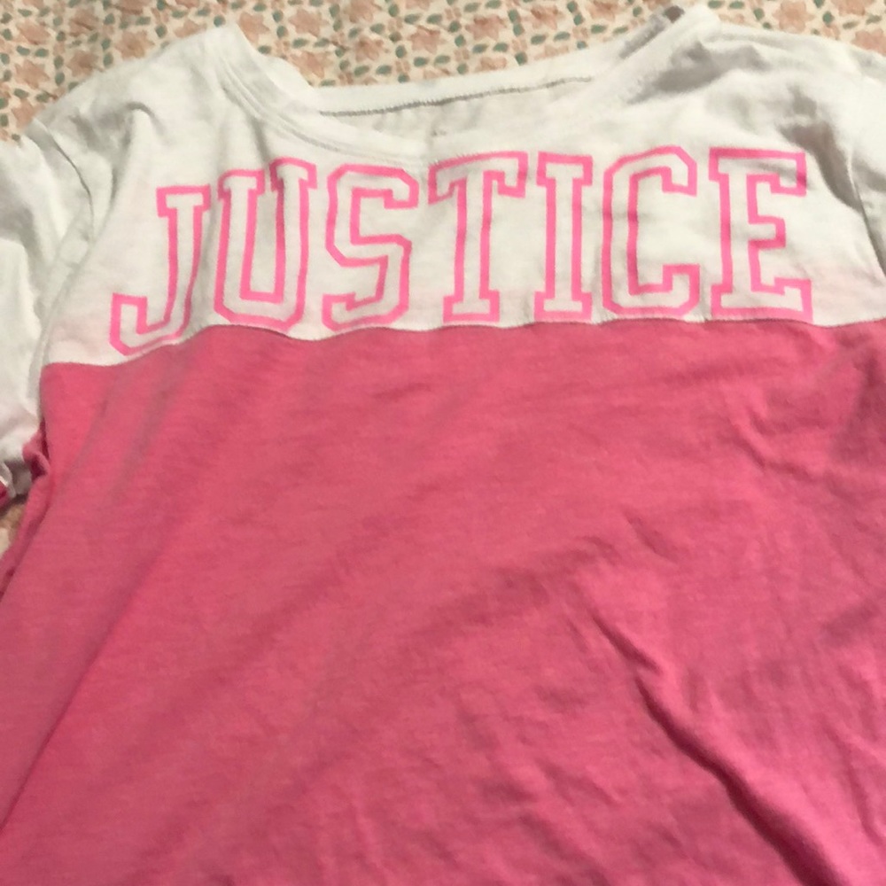 A pink and white justice shirt longsleeve